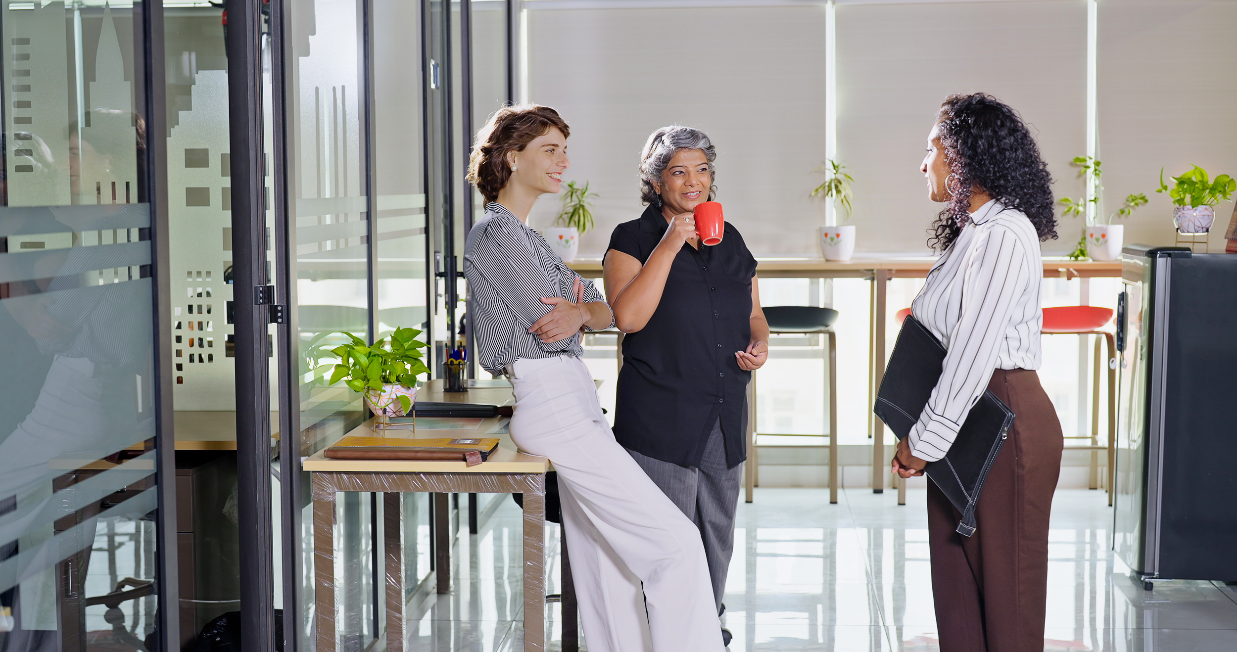 Employees in a breakout room discussing their corporate health insurance plan