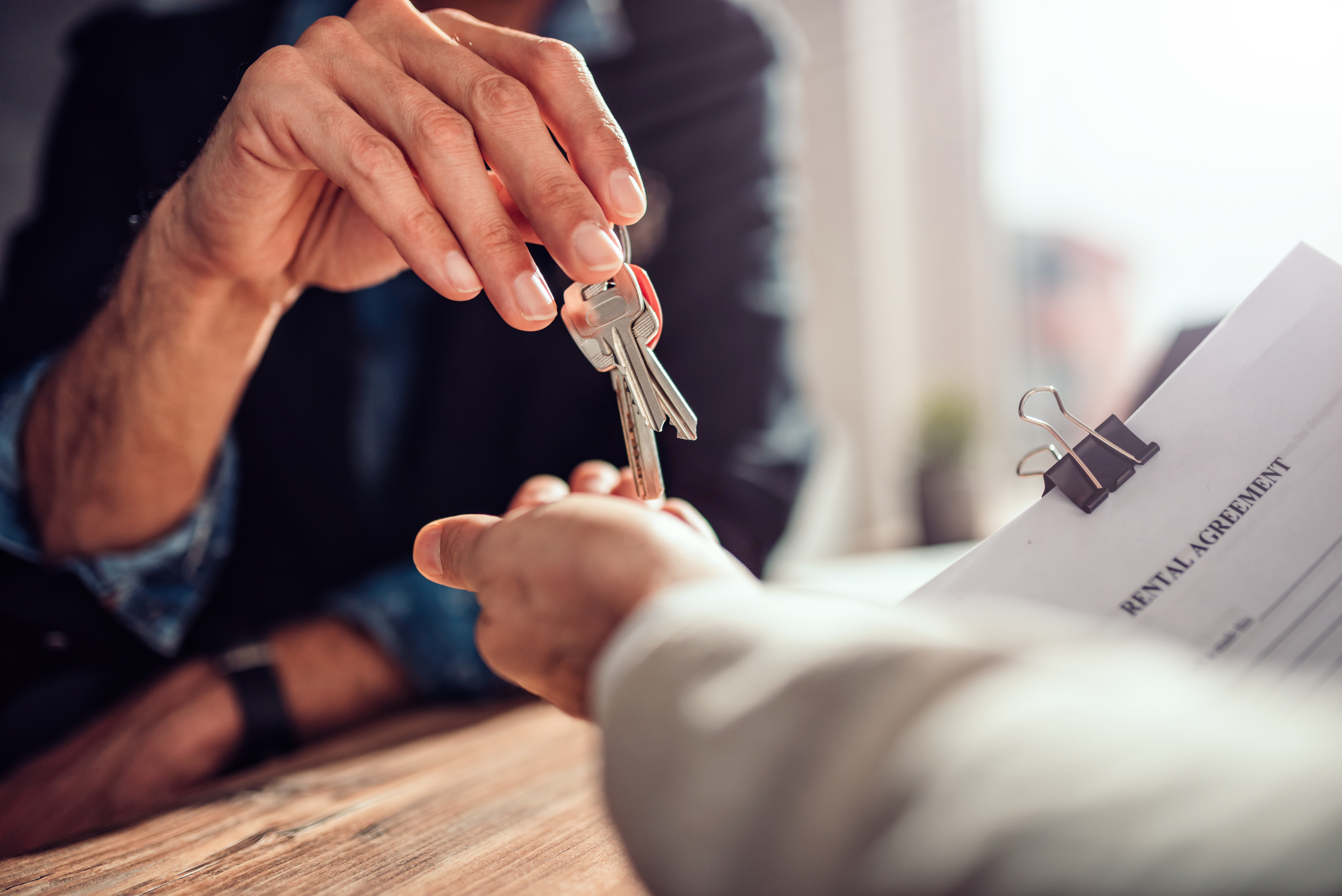 Landlord handing over keys