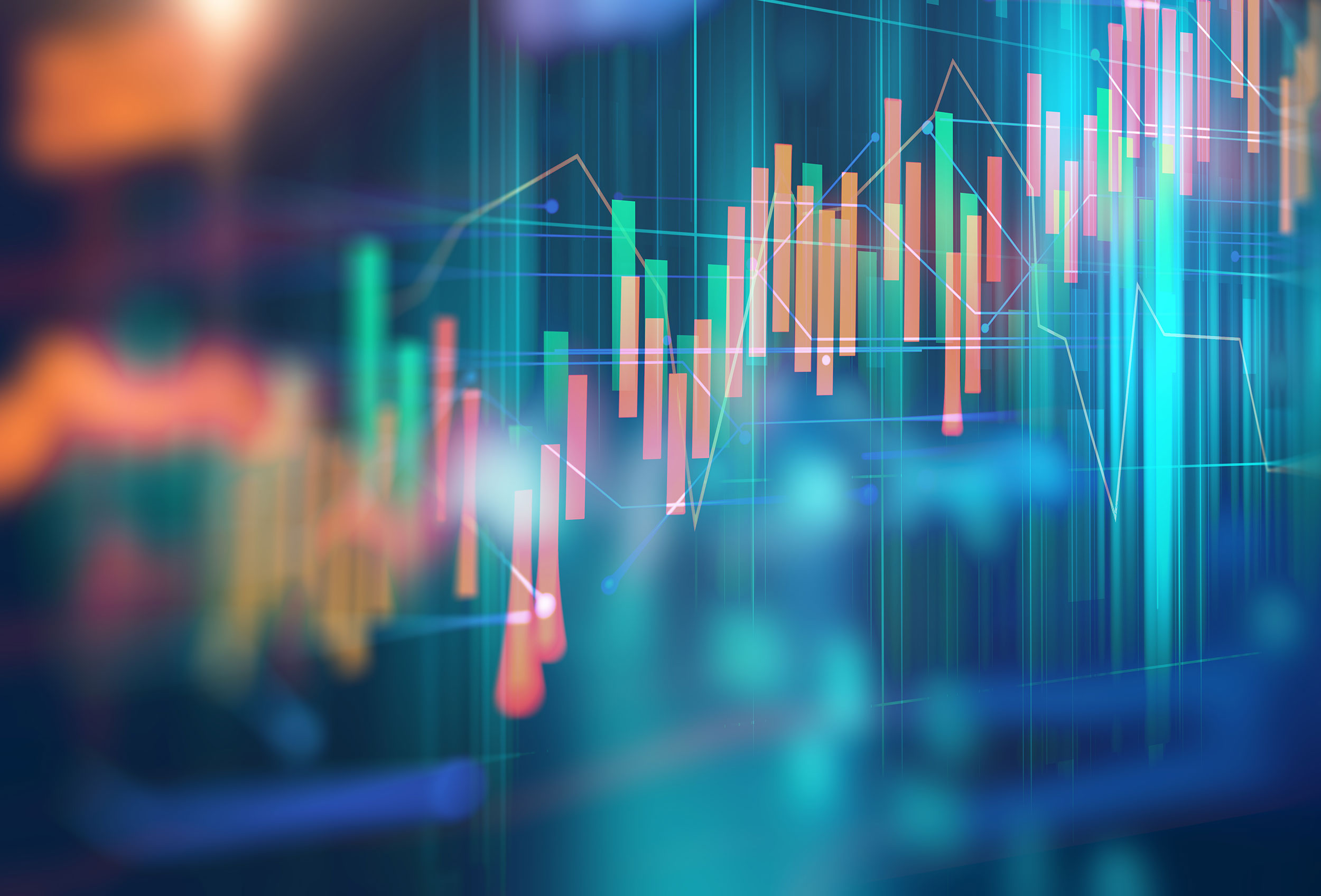 A digital screen shows a bar chart of financial growth